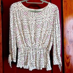 New (with tag) size L patterned peplum top from Francesca’s (brand Everly).